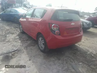 2013 Chevrolet Sonic LT with VIN 1G1JC6SH4D4205877, listed as a IAAI auction lot 41461380 with 113,780 mi miles. Bid and sale history available at carsss.com. Image 2.