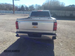 2014 Chevrolet Silverado 1500 LT with VIN 1GCVKREC7EZ120159, listed as a IAAI auction lot 41191282 with 206,836 mi miles and . Bid and sale history available at DreamBid. Image 16.