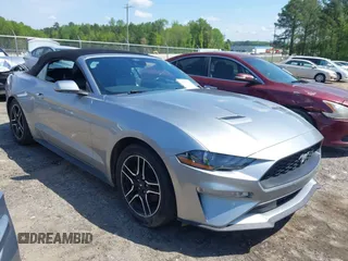 2021 Ford Mustang EcoBoost z VIN 1FATP8UH4M5124553, wystawiony jako IAAI lot #41995612 z przebiegiem 93 291 mil mil oraz . Historia ofert i sprzedaży dostępna na DreamBid. Obrazek 1.