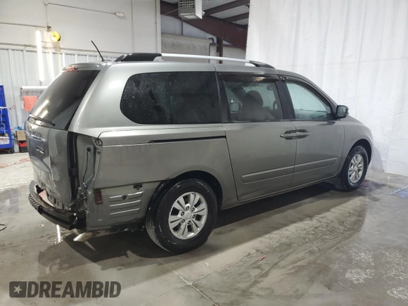 2012 Kia Sedona LX with VIN KNDMG4C79C6433461, listed as a Copart auction lot 71585454 with 164,994 mi miles and Salvage Title. Bid and sale history available at carsss.com. Image 3.