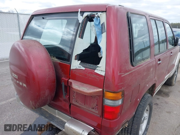 1999 Isuzu Trooper S with VIN JACDJ58X8X7920942, listed as a IAAI auction lot 42029335 with 164,186 mi miles and . Bid and sale history available at DreamBid. Image 12.