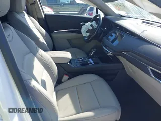 2019 Cadillac XT4 FWD Luxury z VIN 1GYAZAR4XKF170642, wystawiony jako IAAI lot #41585684 z przebiegiem 74 512 mil mil oraz . Historia ofert i sprzedaży dostępna na DreamBid. Obrazek 5.