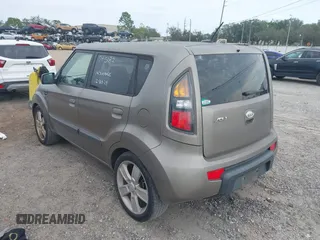 2010 Kia Soul + with VIN KNDJT2A22A7045182, listed as a IAAI auction lot 41322297 with 178,817 mi miles. Bid and sale history available at carsss.com. Image 3.