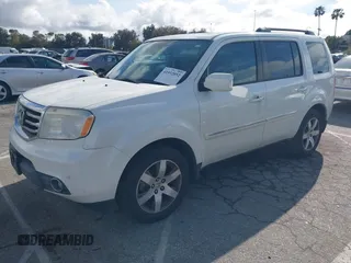 2015 Honda Pilot Touring with VIN 5FNYF3H93FB007766, listed as a IAAI auction lot 41932052 with 131,036 mi miles. Bid and sale history available at carsss.com. Image 17.