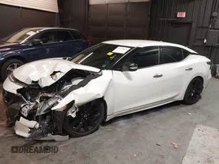 2016 Nissan Maxima SL with VIN 1N4AA6AP2GC439621, listed as a IAAI auction lot 41745052 with 23,484 mi miles and . Bid and sale history available at DreamBid. Image 2.