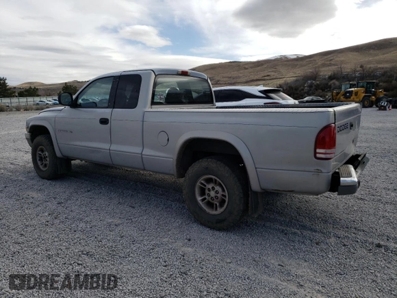 1999 Dodge Dakota SLT with VIN 1B7GG22Y2XS165166, listed as a Copart auction lot 47440435 with 167,345 mi miles and Salvage Title. Bid and sale history available at DreamBid. Image 2.
