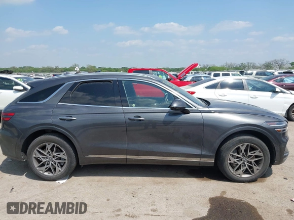 2023 Genesis GV70 2.5T with VIN KMUMADTB9PU084936, listed as a IAAI auction lot 42040232 with 28,201 mi miles and . Bid and sale history available at DreamBid. Image 13.