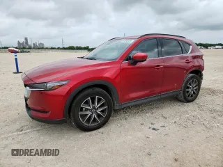 2018 Mazda CX-5 Grand Touring с VIN JM3KFADM8J0451535, выставлен на аукционе Copart как лот 59990435 с пробегом 77 163 миль миль и Списание • Salvage title. История ставок и продаж доступна на DreamBid. Изображение 1.