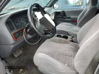 1998 Jeep Grand Cherokee Laredo with VIN 1J4GZ58SXWC293835, listed as a Copart auction lot 47557855 with 217,948 mi miles and Salvage Title. Bid and sale history available at carsss.com. Image 7.