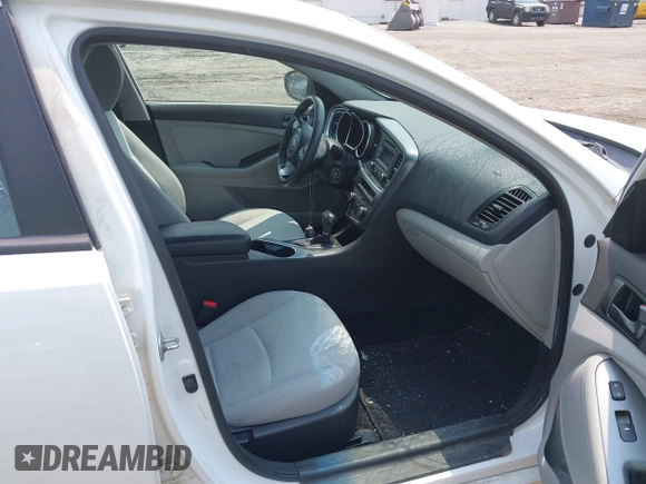 2015 Kia Optima LX with VIN 5XXGM4A71FG356034, listed as a IAAI auction lot 42402142 with 131,376 mi miles and . Bid and sale history available at DreamBid. Image 5.