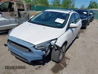 2018 Ford Focus Titanium with VIN 1FADP3N24JL279449, listed as a IAAI auction lot 42297780 with 144,479 mi miles and . Bid and sale history available at DreamBid. Image 2.