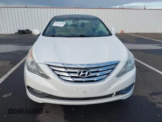2014 Hyundai Sonata SE with VIN 5NPEC4AC5EH880717, listed as a IAAI auction lot 41275243 with 145,577 mi miles and . Bid and sale history available at DreamBid. Image 12.