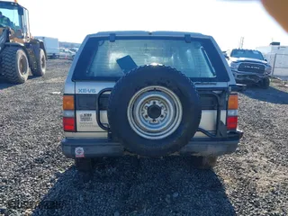 1992 Nissan Pathfinder LE with VIN JN8HD17Y4NW014548, listed as a IAAI auction lot 41461969 with 245,282 mi miles. Bid and sale history available at carsss.com. Image 15.
