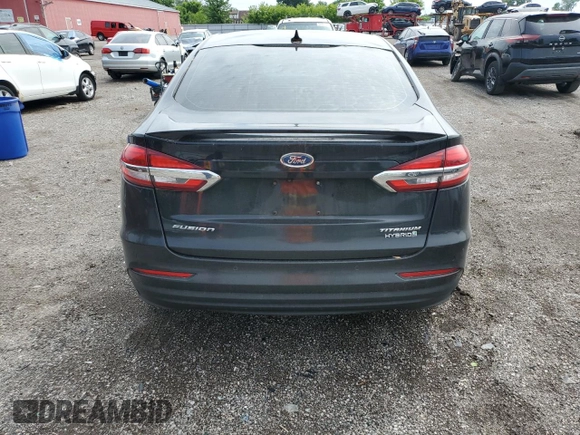 2019 Ford Fusion Titanium z VIN 3FA6P0RU4KR211674, wystawiony jako Copart lot #62205885 z przebiegiem 313 261 mil mil oraz Szkoda całkowita • Salvage title. Historia ofert i sprzedaży dostępna na DreamBid. Obrazek 6.