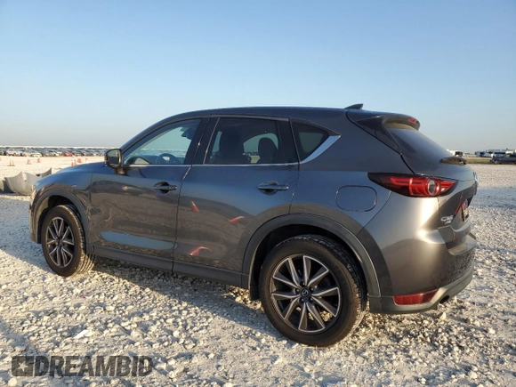 2017 Mazda CX-5 Grand Touring with VIN JM3KFBDL1H0148961, listed as a Copart auction lot 52648115 with 171,767 mi miles and Salvage Title. Bid and sale history available at carsss.com. Image 2.