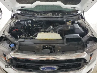2023 Ford F-150 XL with VIN 1FTFW1E59PKE35312, listed as a Copart auction lot 50796195 with 19,849 mi miles and Salvage Title. Bid and sale history available at carsss.com. Image 11.