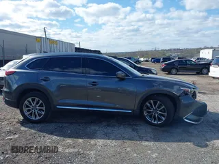 2019 Mazda CX-9 Signature with VIN JM3TCBEYXK0324257, listed as a IAAI auction lot 41986590 with Not provided miles and . Bid and sale history available at DreamBid. Image 13.