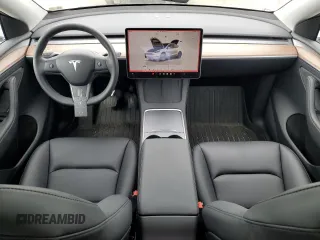2025 Tesla Model Y Long Range with VIN 7SAYGDED5SF241318, listed as a Copart auction lot 51614245 with 3,682 mi miles and Salvage Title. Bid and sale history available at DreamBid. Image 8.