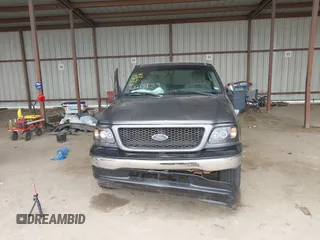 2002 Ford F-150 XL with VIN 1FTRX17242NB82159, listed as a IAAI auction lot 42283839 with 163,685 mi miles and . Bid and sale history available at DreamBid. Image 12.