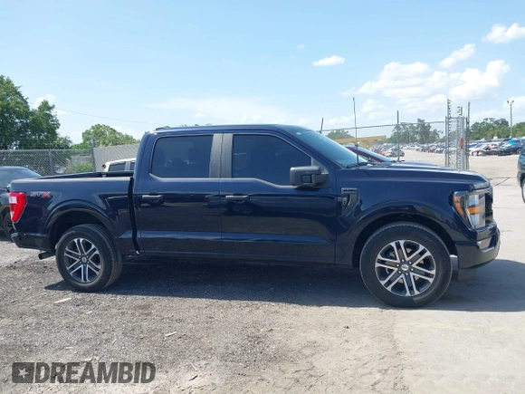 2023 Ford F-150 XL z VIN 1FTEW1CP0PKD72617, wystawiony jako IAAI lot #42642922 z przebiegiem 52 966 mil mil oraz . Historia ofert i sprzedaży dostępna na DreamBid. Obrazek 13.