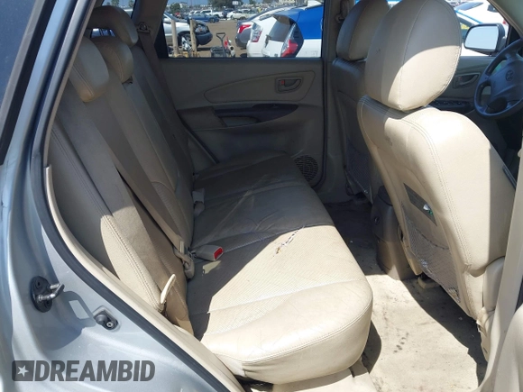 2007 Hyundai Tucson SE with VIN KM8JN12D07U632975, listed as a IAAI auction lot 42099734 with 154,320 mi miles. Bid and sale history available at carsss.com. Image 8.