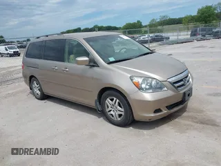 2005 Honda Odyssey EX with VIN 5FNRL38475B029026, listed as a IAAI auction lot 42489079 with 156,075 mi miles and . Bid and sale history available at DreamBid. Image 1.