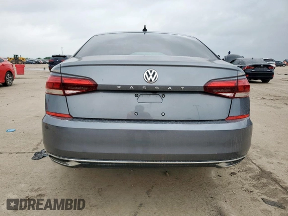 2020 Volkswagen Passat SE z VIN 1VWSA7A38LC010962, wystawiony jako Copart lot #57520325 z przebiegiem 76 566 mil mil oraz Czysty tytuł • Clean title. Historia ofert i sprzedaży dostępna na DreamBid. Obrazek 6.