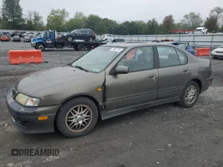 2000 Infiniti G20 Luxury z VIN JNKCP11A1YT304887, wystawiony jako Copart lot #74562724 z przebiegiem 202 140 mil mil oraz Czysty tytuł • Clean title. Historia ofert i sprzedaży dostępna na DreamBid. Obrazek 1.