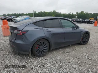 2022 Tesla Model Y Performance with VIN 7SAYGDEF7NF507184, listed as a Copart auction lot 58329875 with 98,320 mi miles and Salvage title. Bid and sale history available at DreamBid. Image 3.