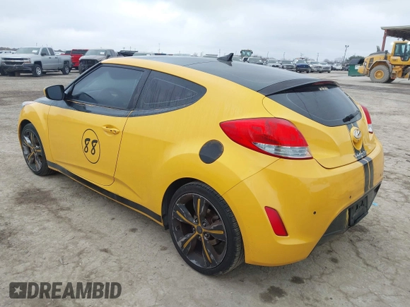 2013 Hyundai Veloster w/Black Int with VIN KMHTC6AD4DU167576, listed as a IAAI auction lot 41491479 with 90,033 mi miles and . Bid and sale history available at DreamBid. Image 3.