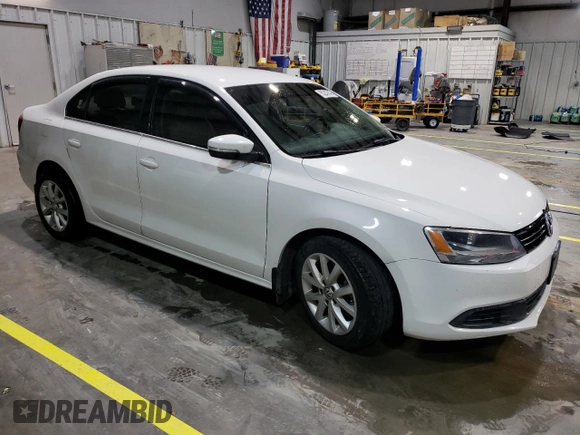 2013 Volkswagen Jetta SE with VIN 3VWDX7AJ3DM443160, listed as a Copart auction lot 55247845 with 334,107 mi miles and Salvage title. Bid and sale history available at DreamBid. Image 4.