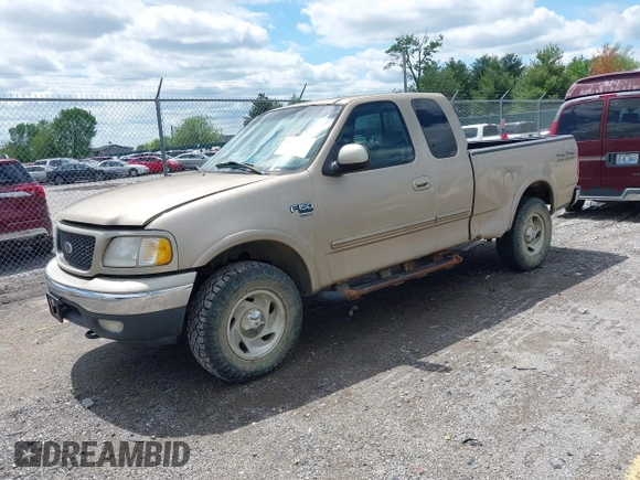 2000 Ford F-150 XL with VIN 1FTRX18L9YNB70363, listed as a IAAI auction lot 42140312 with 226,686 mi miles and . Bid and sale history available at DreamBid. Image 2.