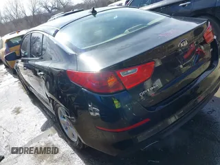 2015 Kia Optima LX with VIN KNAGM4A71F5652818, listed as a IAAI auction lot 41656933 with 251,967 mi miles. Bid and sale history available at carsss.com. Image 3.
