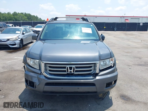 2013 Honda Ridgeline RTL with VIN 5FPYK1F5XDB012354, listed as a IAAI auction lot 42392921 with 248,223 mi miles and . Bid and sale history available at DreamBid. Image 12.
