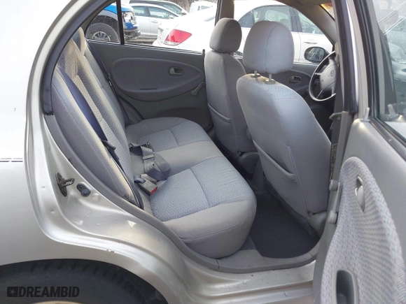 2001 Kia Rio with VIN KNADC123716042067, listed as a IAAI auction lot 41449479 with 113,108 mi miles. Bid and sale history available at carsss.com. Image 8.