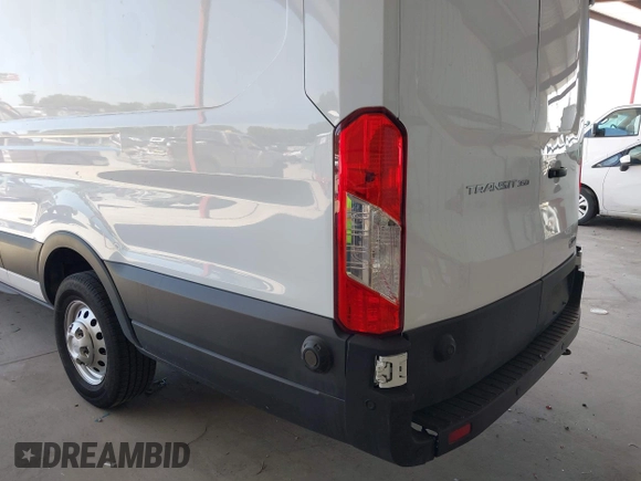 2022 Ford Transit Cargo with VIN 1FTBW3X89NKA69141, listed as a IAAI auction lot 41980864 with 102,721 mi miles and . Bid and sale history available at DreamBid. Image 21.