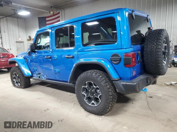 2022 Jeep Wrangler Unlimited Rubicon with VIN 1C4JJXR69NW190564, listed as a Copart auction lot 83703504 with 16,803 mi miles and Salvage title. Bid and sale history available at DreamBid. Image 2.