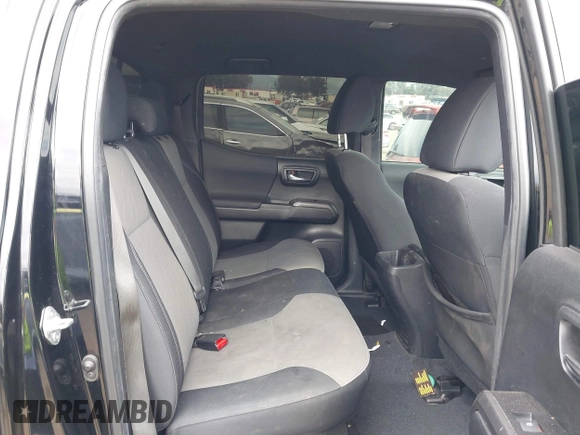 2023 Toyota Tacoma SR z VIN 3TMCZ5AN4PM548729, wystawiony jako IAAI lot #42078723 z przebiegiem 30 966 mil mil oraz . Historia ofert i sprzedaży dostępna na DreamBid. Obrazek 8.