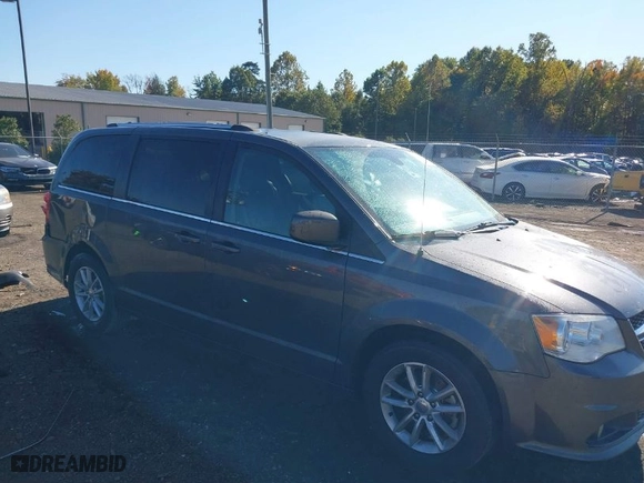 2019 Dodge Grand Caravan SXT with VIN 2C4RDGCG2KR656139, listed as a IAAI auction lot 40643548 with 126,674 mi miles. Bid and sale history available at carsss.com. Image 1.
