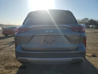 2019 Infiniti QX50 Essential with VIN 3PCAJ5M39KF117065, listed as a Copart auction lot 50702595 with 95,899 mi miles and Salvage title. Bid and sale history available at DreamBid. Image 6.