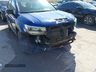 2023 Volkswagen Taos S z VIN 3VVDX7B24PM323173, wystawiony jako IAAI lot #41763607 z przebiegiem 38 506 mil mil oraz . Historia ofert i sprzedaży dostępna na DreamBid. Obrazek 20.