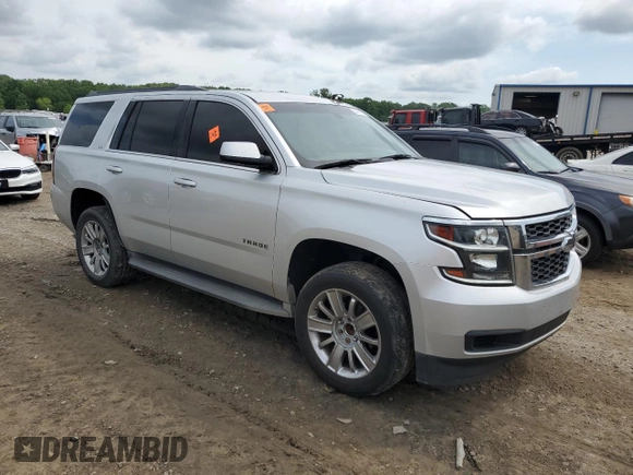 2016 Chevrolet Tahoe LS with VIN 1GNSCAKC7GR292272, listed as a Copart auction lot 54091975 with 221,137 mi miles and Salvage title. Bid and sale history available at DreamBid. Image 4.