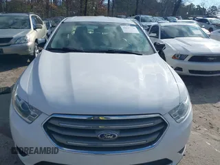 2019 Ford Taurus SEL with VIN 1FAHP2E80KG115318, listed as a IAAI auction lot 41627736 with 111,911 mi miles and . Bid and sale history available at DreamBid. Image 12.