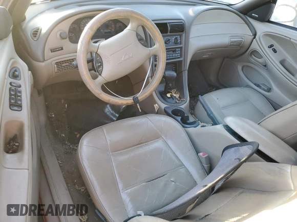 1999 Ford Mustang with VIN 1FAFP4446XF231749, listed as a Copart auction lot 73981604 with Not provided miles and Clean title. Bid and sale history available at DreamBid. Image 8.