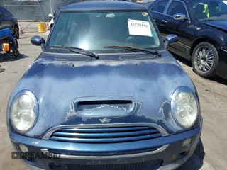 2006 MINI Hardtop S with VIN WMWRE33536TJ35740, listed as a IAAI auction lot 42720196 with 165,852 mi miles and . Bid and sale history available at DreamBid. Image 6.