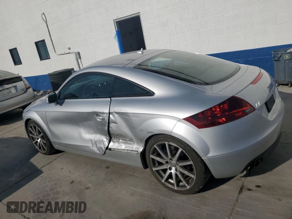 2009 Audi TT z VIN TRUKF38J391020407, wystawiony jako Copart lot #62101664 z przebiegiem 91 585 mil mil oraz Szkoda całkowita • Salvage title. Historia ofert i sprzedaży dostępna na DreamBid. Obrazek 2.