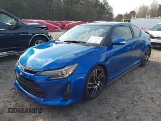 2014 Scion tC with VIN JTKJF5C72E3086001, listed as a IAAI auction lot 41721986 with 207,239 mi miles. Bid and sale history available at carsss.com. Image 19.