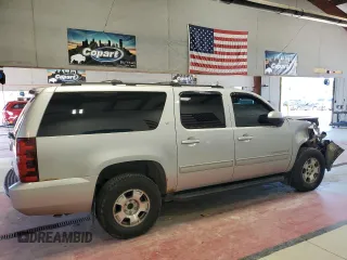 2014 Chevrolet Suburban LT with VIN 1GNSKJE77ER120211, listed as a Copart auction lot 62469424 with 213,282 mi miles and Salvage Title. Bid and sale history available at carsss.com. Image 3.