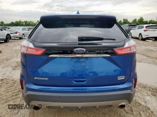 2020 Ford Edge SEL z VIN 2FMPK3J91LBA30033, wystawiony jako Copart lot #60466635 z przebiegiem 68 956 mil mil oraz Szkoda całkowita • Salvage title. Historia ofert i sprzedaży dostępna na DreamBid. Obrazek 6.