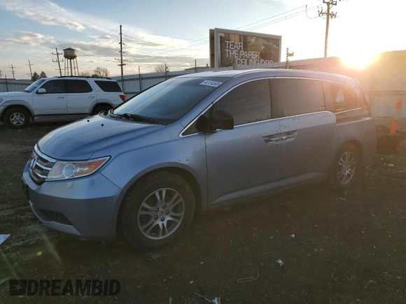 2012 Honda Odyssey EX-L with VIN 5FNRL5H64CB002814, listed as a Copart auction lot 44134505 with 131,235 mi miles and Salvage Title. Bid and sale history available at carsss.com. Image 1.